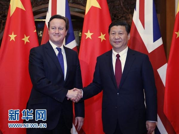 12月2日，國家主席習近平在北京釣魚臺國賓館會見英國首相卡梅倫。 新華社記者 鞠鵬 攝
