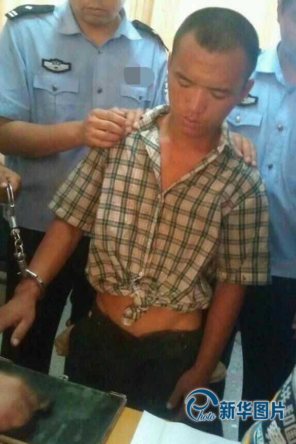 2013年8月20日午間，河南省安陽警方將“8.19公交搶劫案”嫌犯24歲的周江波緝拿歸案。圖片來