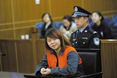 2013年4月3日，被告人小萍在法庭上受審。新京報記者 王貴彬 攝