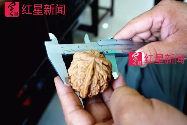 文玩核桃遇冷由幾萬(wàn)一對(duì)降到5元沒(méi)人要？商戶否認(rèn)