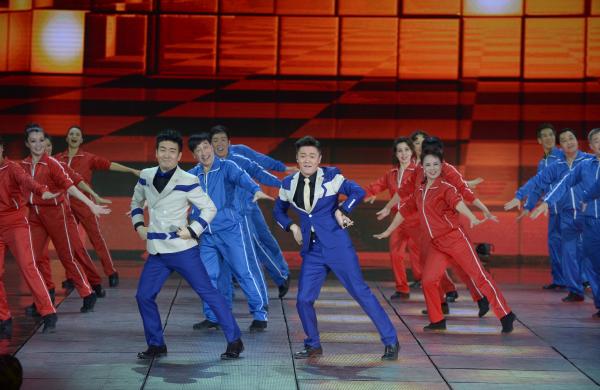《小蘋果》、《最炫民族風(fēng)》等廣場舞曲將會有全國統(tǒng)一、編排科學(xué)、帶給人正能量的全新動作。 CFP 資料